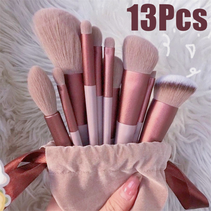 13 piece soft makeup brush set in a pink drawstring velvet pouch.