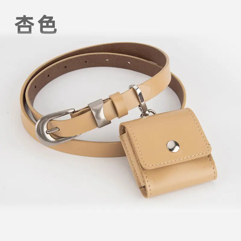 A beige faux leather belt with a matching small pouch attached by a silver metal ring, shown on a light gray background with Chinese text '杏色' in the top left corner.