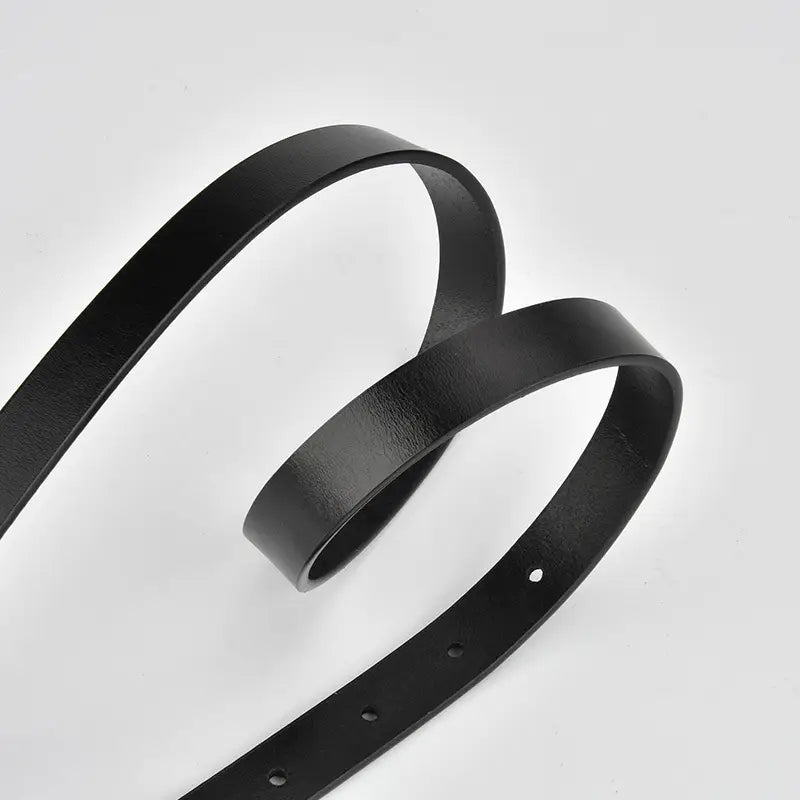A black leather belt with multiple holes, styled in a looped shape on a clean white background.
