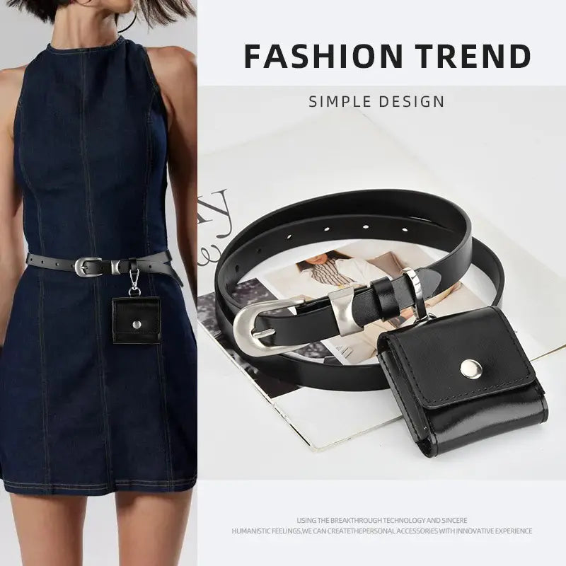 A fashion accessory set featuring a black faux-leather belt with a silver buckle and a matching black card holder pouch, displayed alongside a model wearing a dark blue denim dress with a matching black belt.
