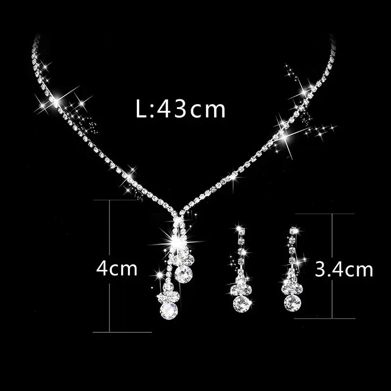 Jewelry set with necklace and earrings on a black background, showing measurements.