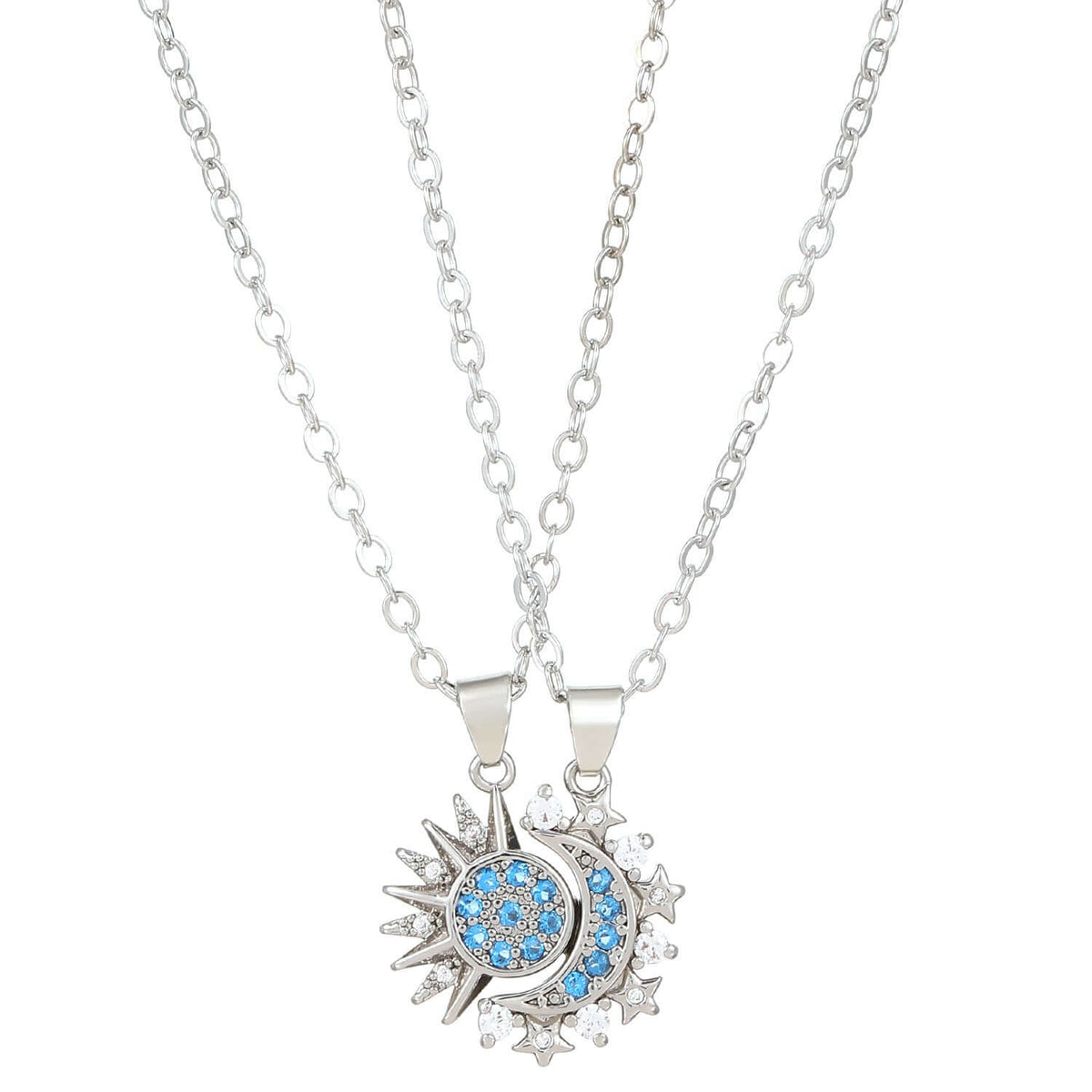 Delicate silver chain necklace with interlocking crystal sun and moon pendant.