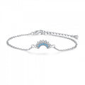 Silver bracelet with a blue gemstone on a white background