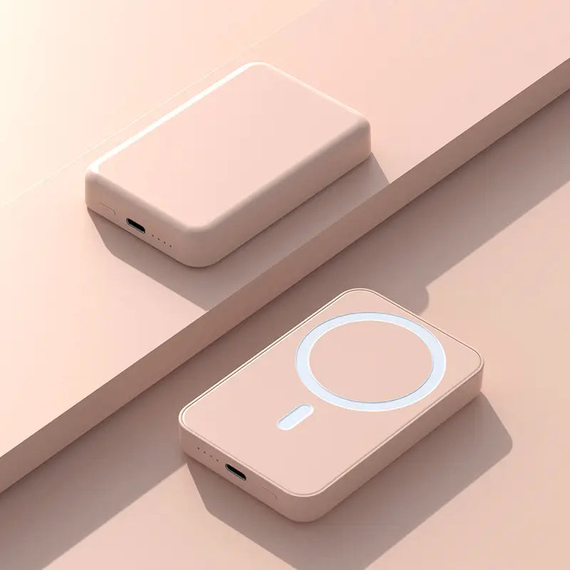 Two pink power banks on a light pink background