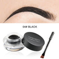 Black eyebrow pomade pot with swatch demo and applicator brush.