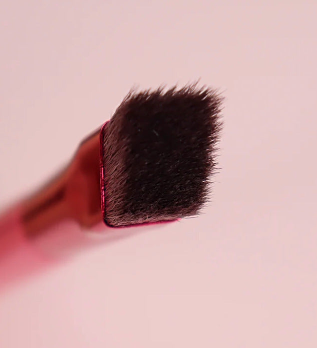 Top macro view of dense, flat bristles on the eyebrow liner brush.
