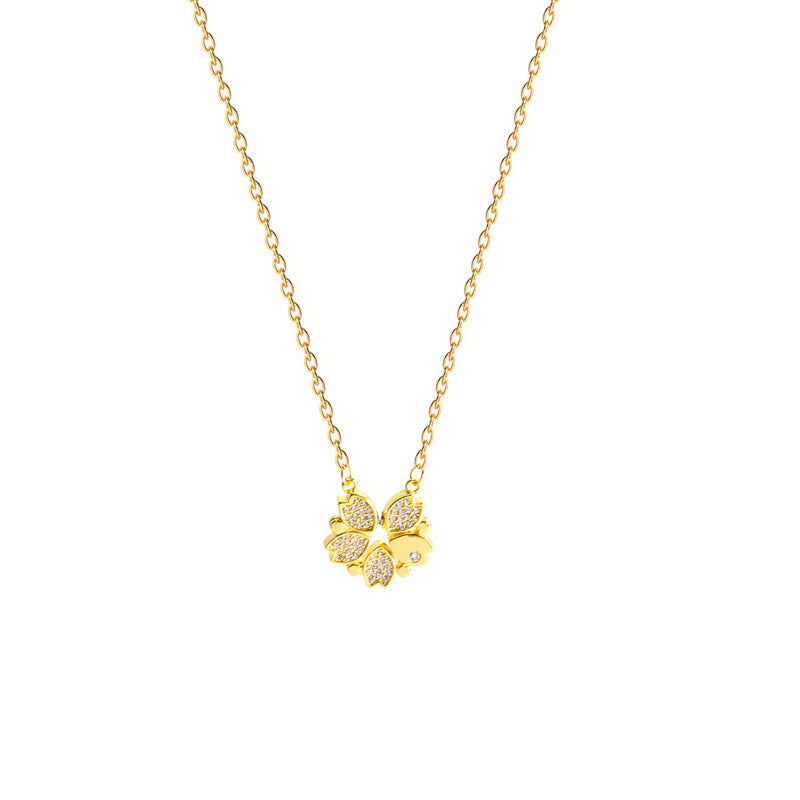  Dual view showing the magnetic clover necklace in gold and silver crystal finish options.