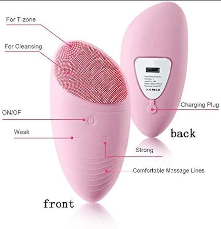 Front and back product views of the ergonomic pink sonic facial brush showing textured bristles and charging port.