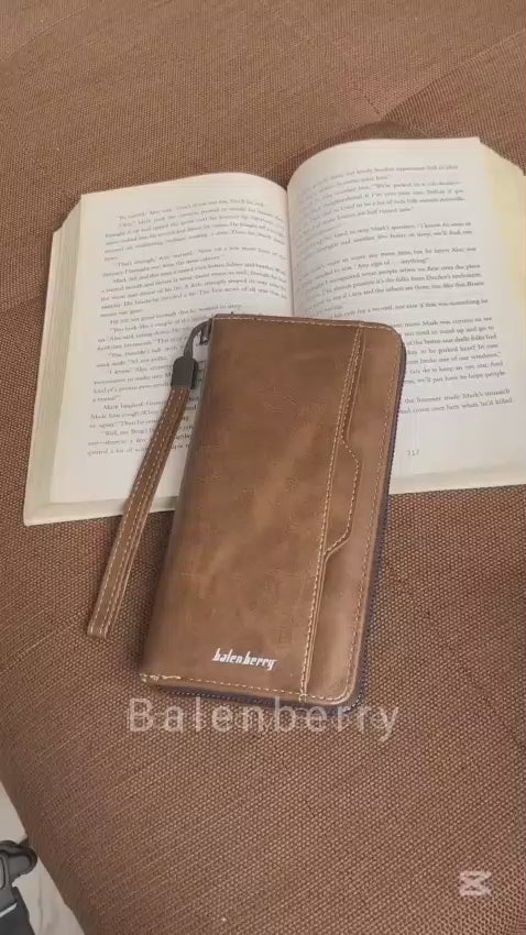 Video showing overview and features of brown long faux leather clutch wallet